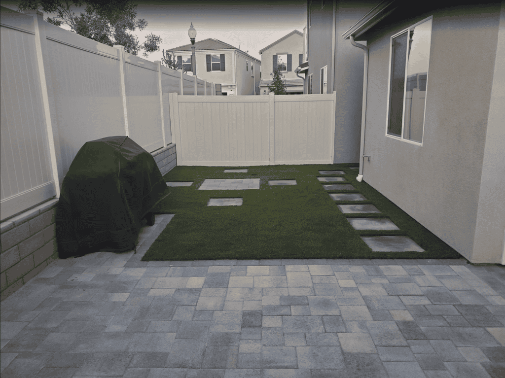 Artificial grass and pavers