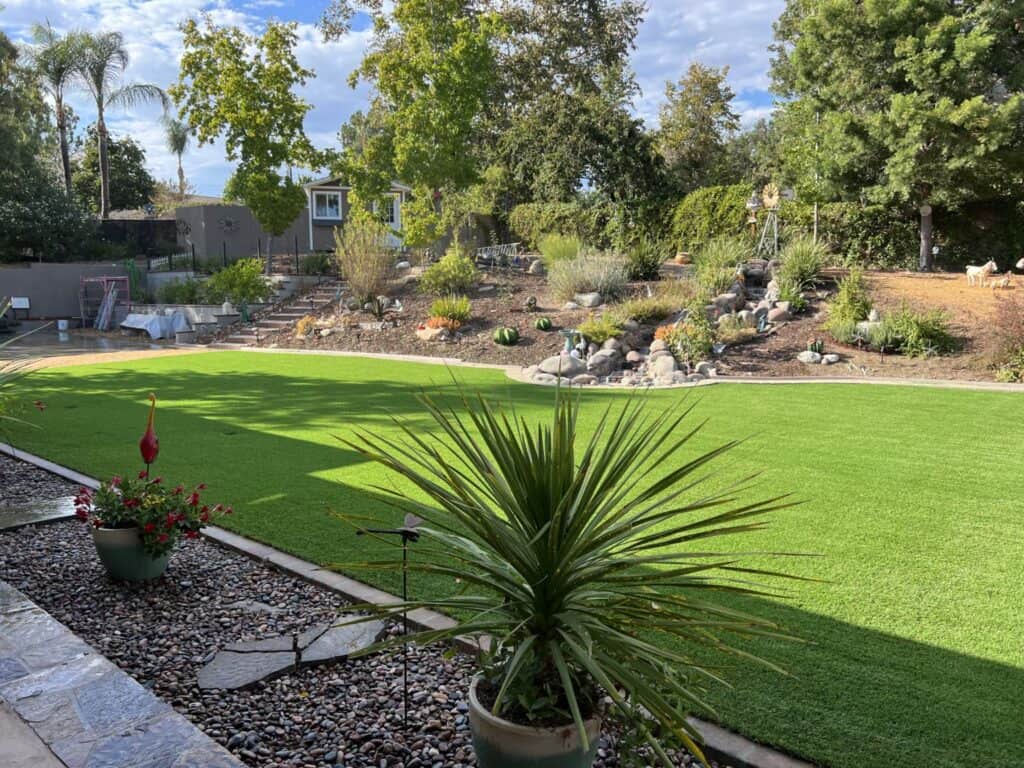 Same backyard after artificial turf installation