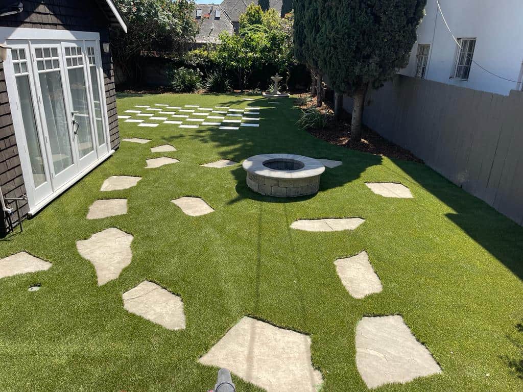 Backyard artificial turf after installation
