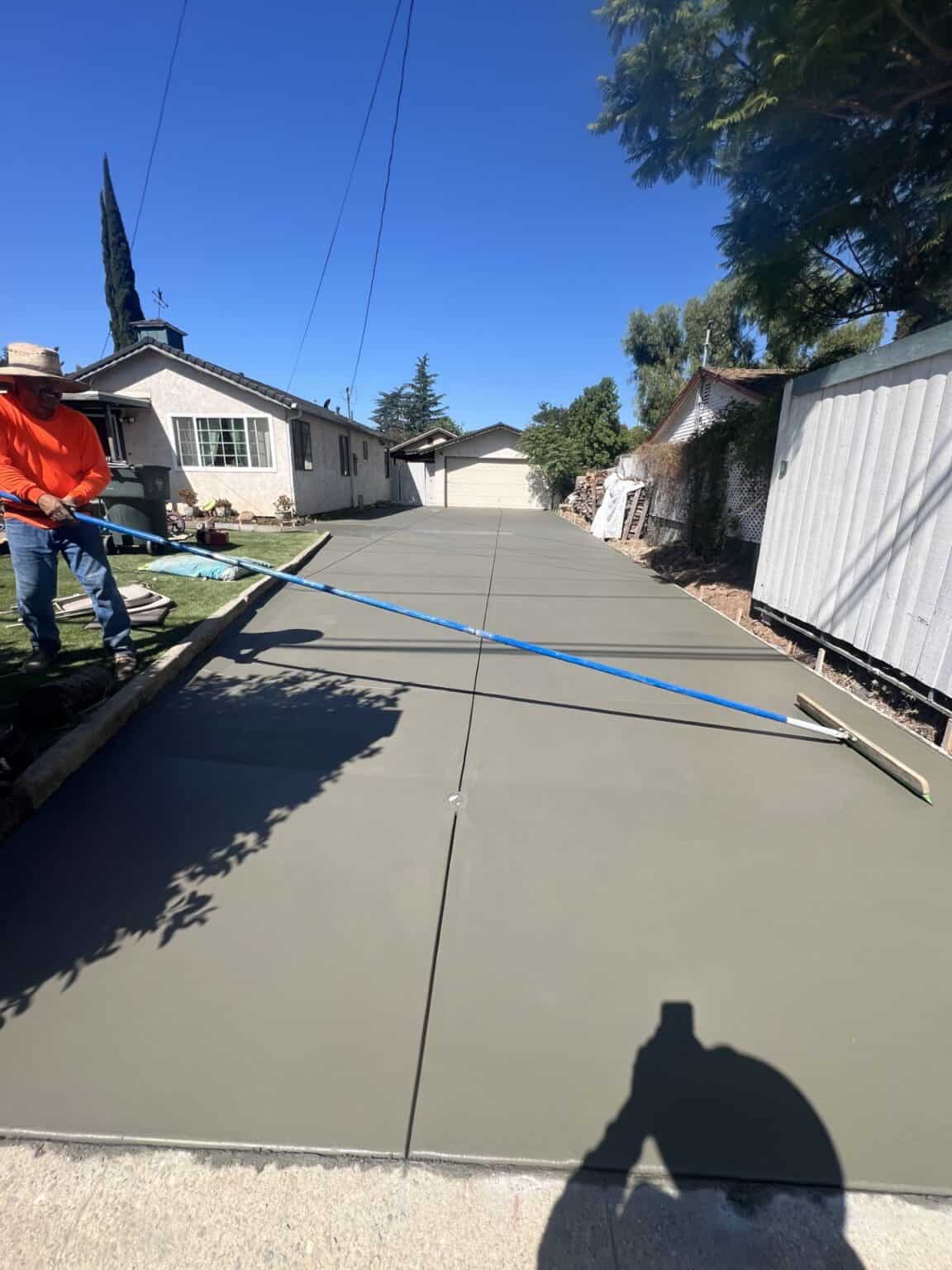 Finished concrete driveway and walkway after installation