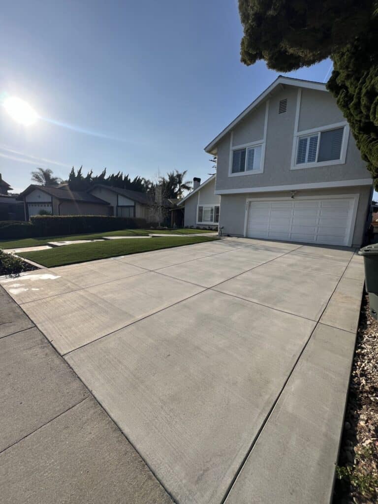New concrete driveway poured by VC Turf