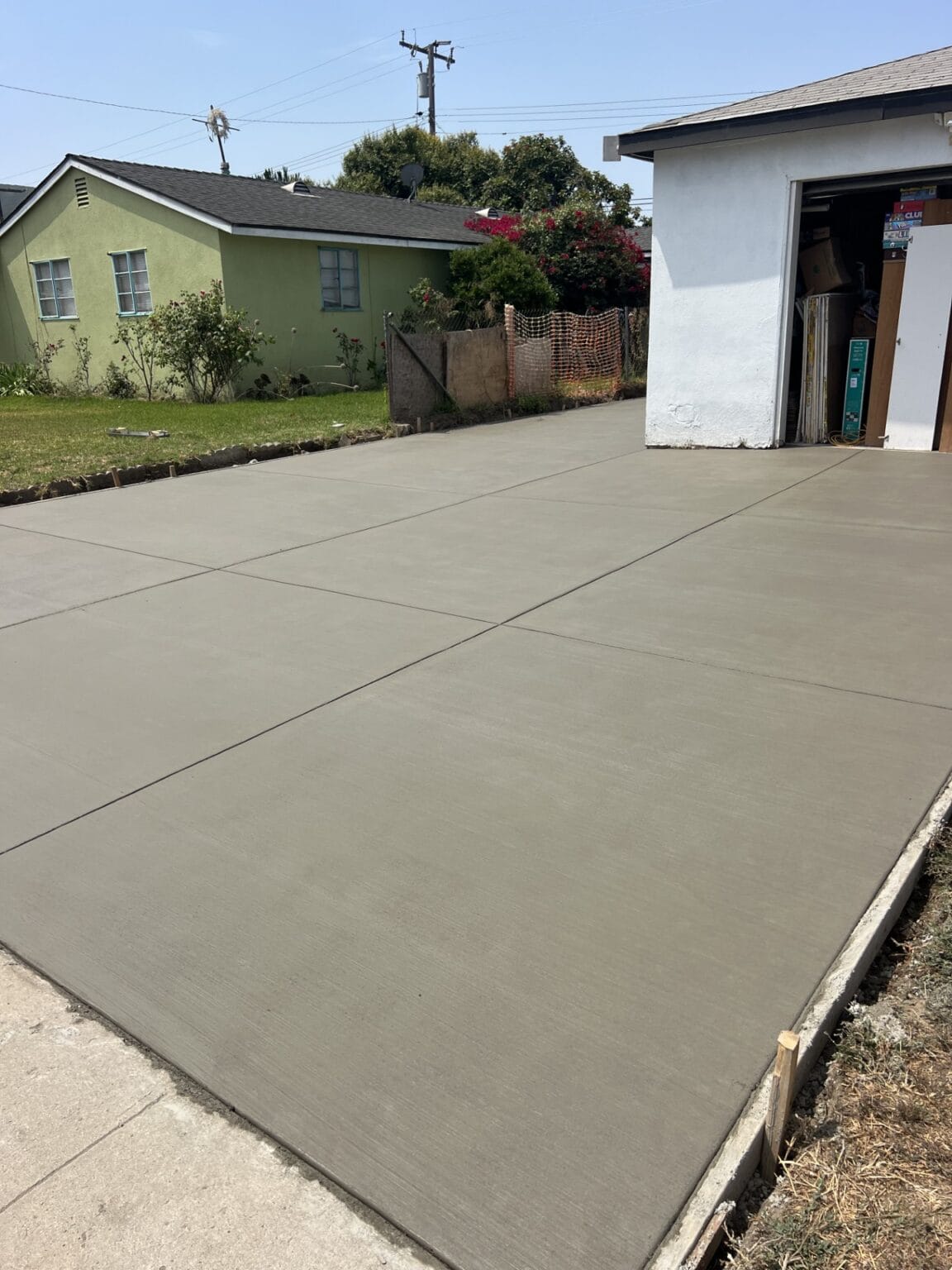 Same driveway after a new concrete driveway was poured