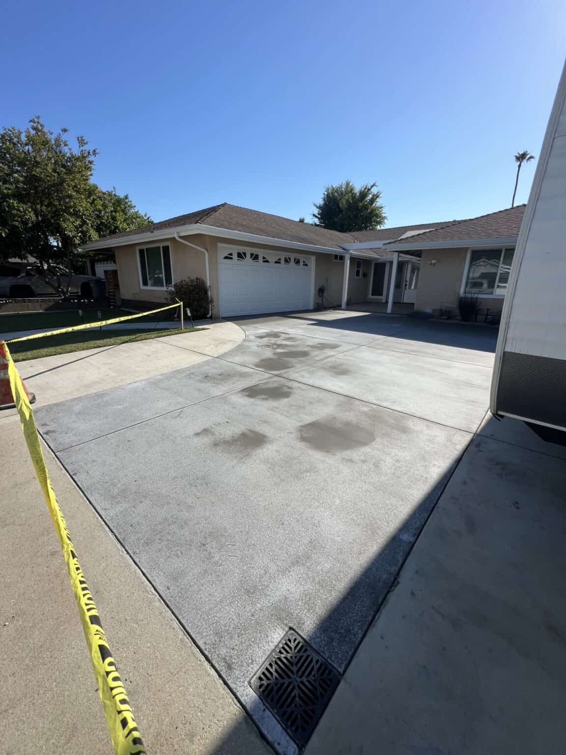 New concrete driveway finished by VC Turf